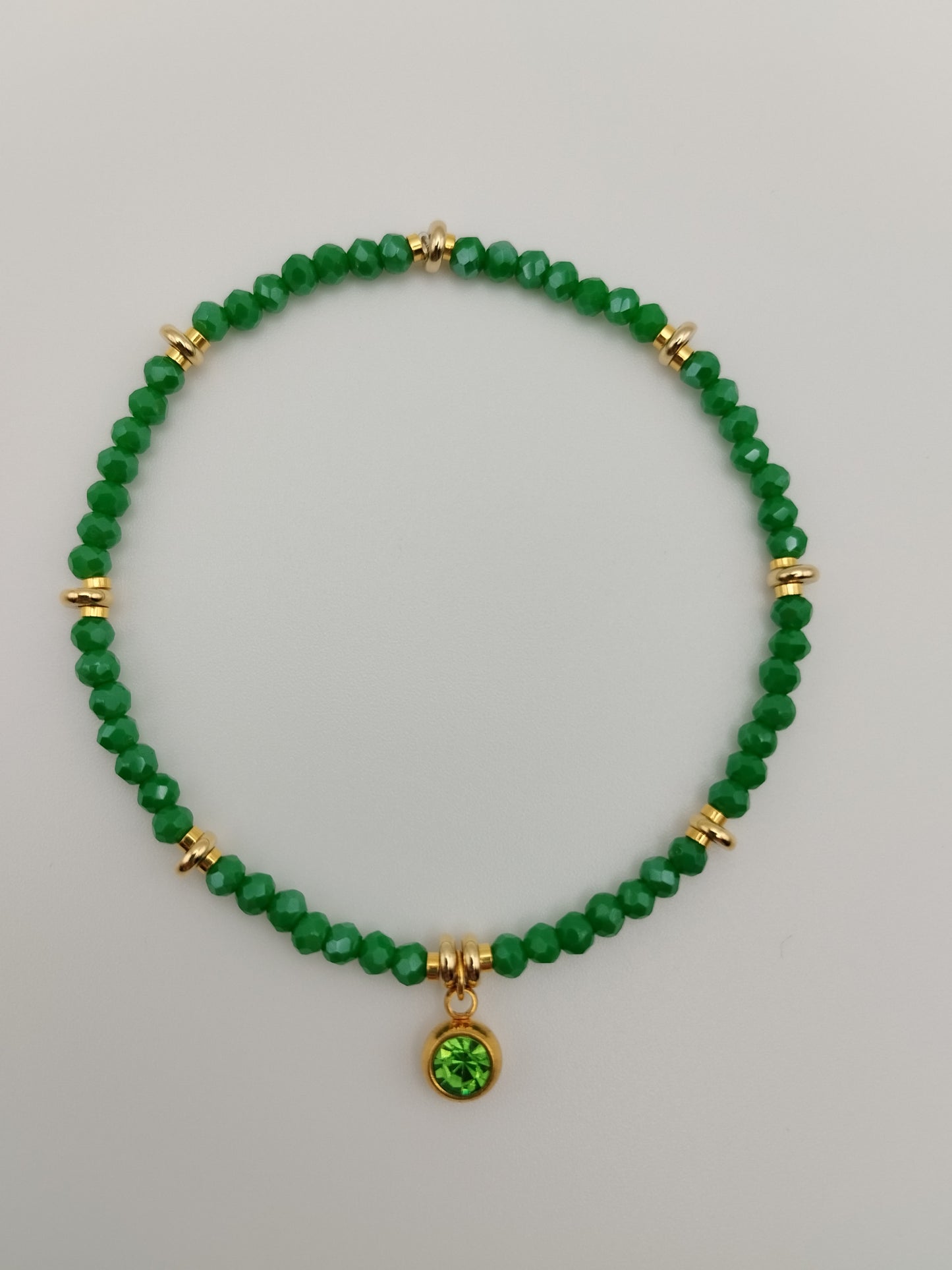 Pulsera verde con cristal de la suerte