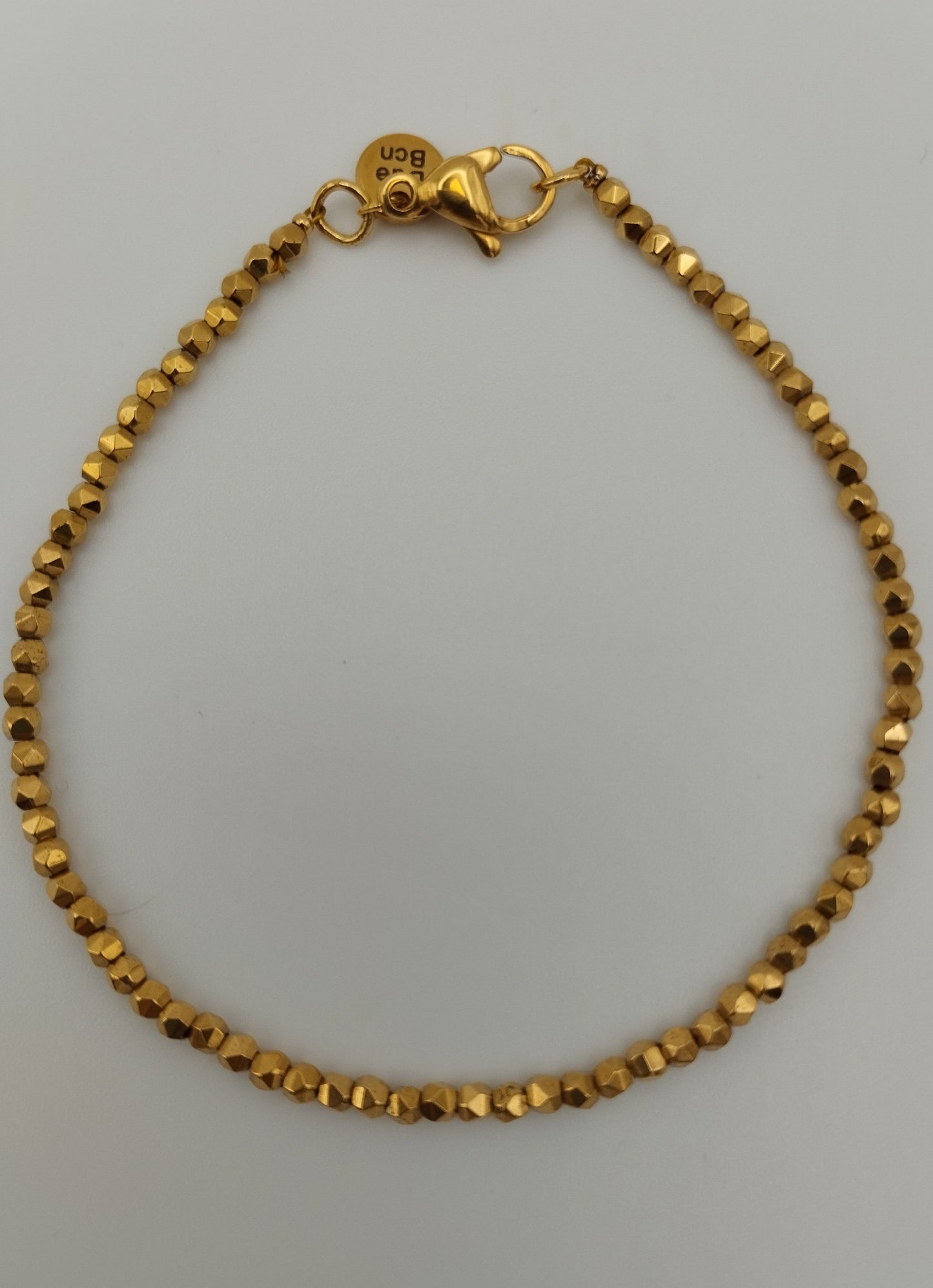 Pulsera Hematita Facetada bañada en Oro